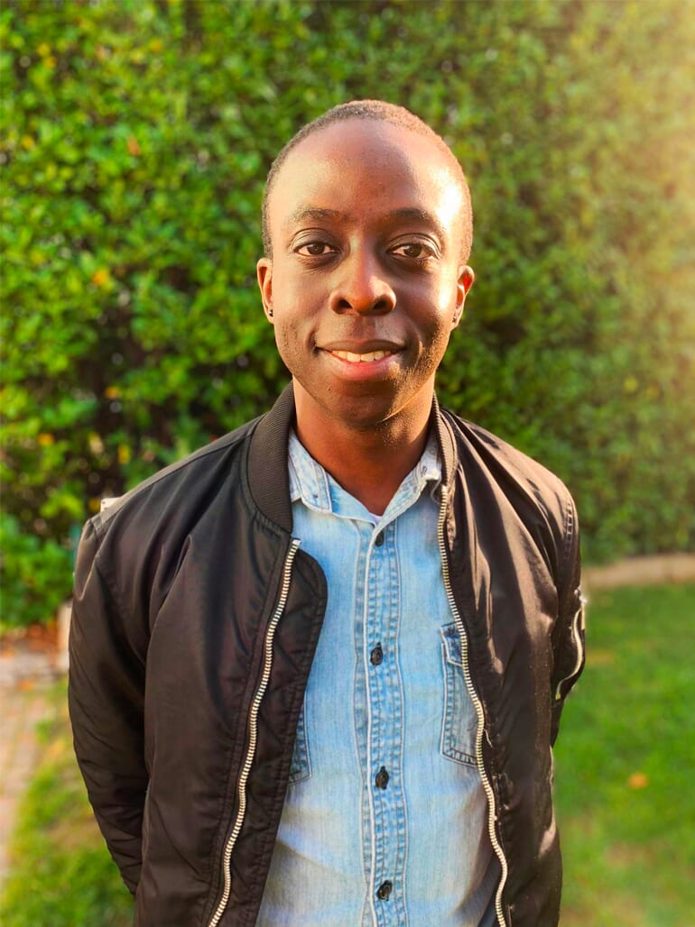 Jerome Kalumbu smiling in Navigli, Milano